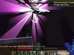 Una captura de pantalla de un usuario derrotando al Dragón Ender en Minecraft