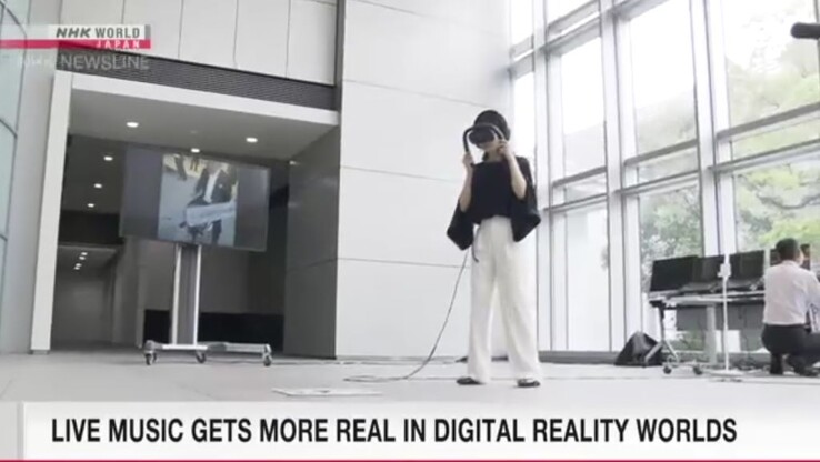 Los auriculares de realidad mixta de Canon para actuaciones musicales proyectan vídeos de hasta 50 cámaras en unos ligeros auriculares de RM con anclaje. (Fuente: NHK World News)