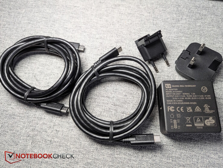Contenido de la caja: 2× cables USB-C a USB-C y 1 adaptador de corriente (adaptador UE + RU)