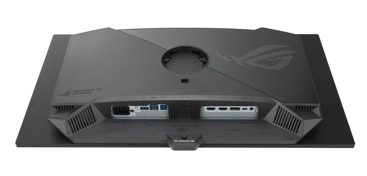El ROG Strix XG27UCDMG también tiene un soporte y una fuente de alimentación externa diferentes en comparación con el ROG Strix PG27UCDM. (Fuente de la imagen: Asus)