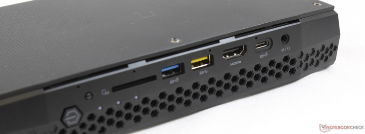 Delantero: botón de encendido, receptor IR, lector SD, USB 3.1, USB 2.0, HDMI 2.0a, USB Type-C Gen. 2, audio combinado de 3.5 mm