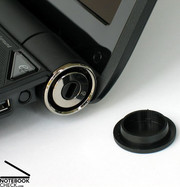 The power connector and the Kensington lock are placed near the display hinges.