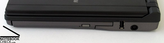 Lado Derecho: DVD drive, USB, Conector de Poder