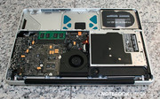 8 screws later you can simply remove the bottom cover…