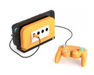 El Retro Fighters BattleDock con una placa frontal naranja picante. (Fuente de la imagen: Retro Fighters/Kickstarter)