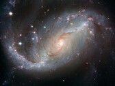 Una imagen que muestra una galaxia espiral.