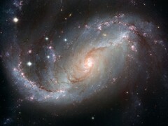 Una imagen que muestra una galaxia espiral.