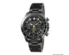 Cronógrafo negro de la colaboración Seiko con la locomotora de vapor D51, con detalles dorados en la esfera y brazalete de acero inoxidable.