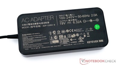 adaptador de corriente de 120 vatios (abajo)