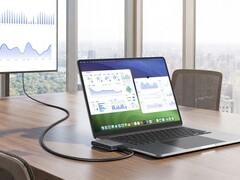 El nuevo Nano USB-C Hub de Anker (en la imagen junto a un portátil y un monitor) se ha lanzado en el Reino Unido. (Fuente de la imagen: Anker)