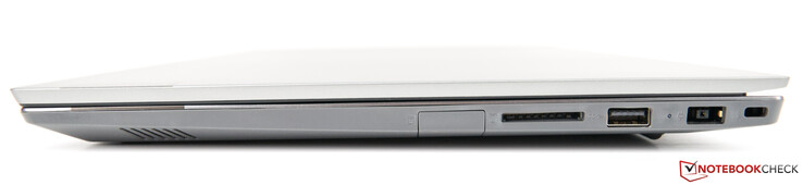 Lado derecho: USB 2.0 Tipo-A (escondido detrás de una solapa), lector de tarjetas 4 en 1, USB 3.1 Gen 1 Tipo-A, conector de alimentación, ranura de bloqueo Kensington