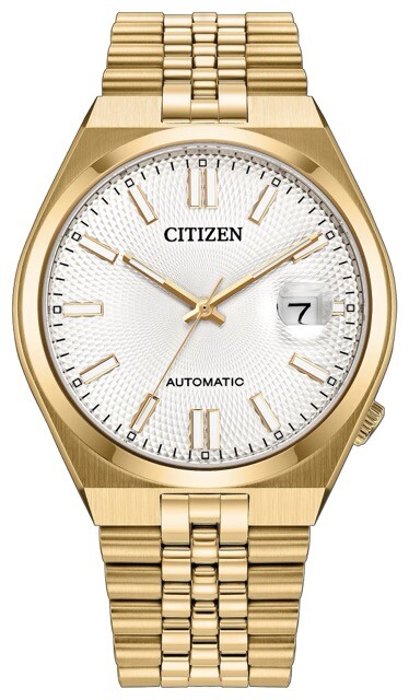 Reloj automático Citizen Tsuyosa 60 con caja de acero inoxidable en tono dorado y brazalete estilo Jubilee, esfera blanca con motivo guilloché y lupa ciclópica para la fecha.