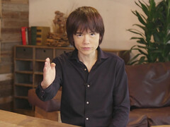 Masahiro Sakurai, creador de juegos de Nintendo, sentado a la mesa (Fuente de la imagen: The Guardian)